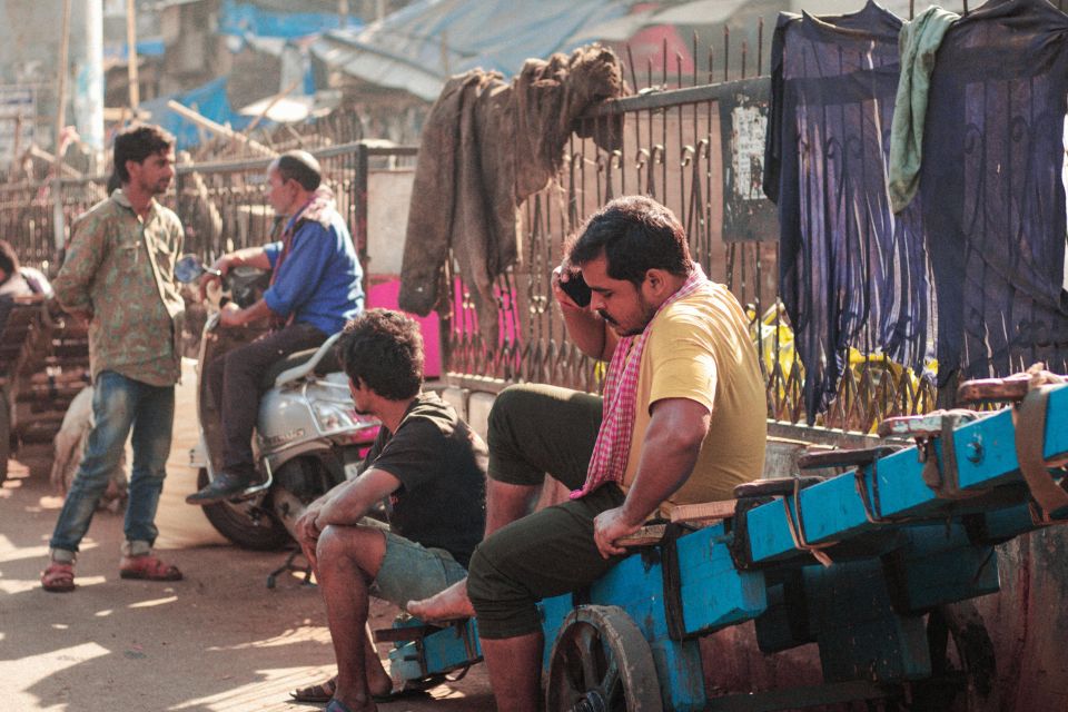 Dharavi: Daily Life inside Asia's Largest Slum walking tour - Dhobi Ghat and the rhythm of open-air laundry