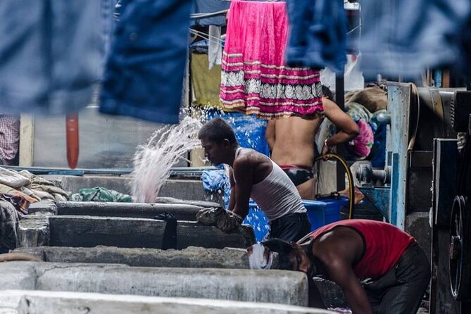 Dhobi Ghat Guided Tour A walk inside the biggest open air Laundry - Inside the laundry: washing troughs, drying lines, and charcoal ironing