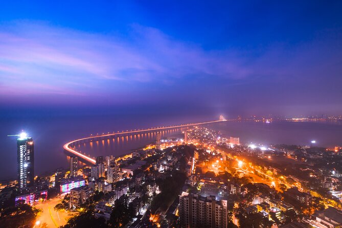 Full Day Mumbai City Tour and Dharavi Slums - Marine Drive and Chowpatty Beach: The Photo Spots You’ll Understand Better