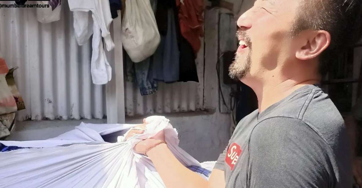 Mumbai: Dhobi Ghat Tour with Dharavi and Train Ride Options - Handwashing, drying, and charcoal ironing (in plain terms)