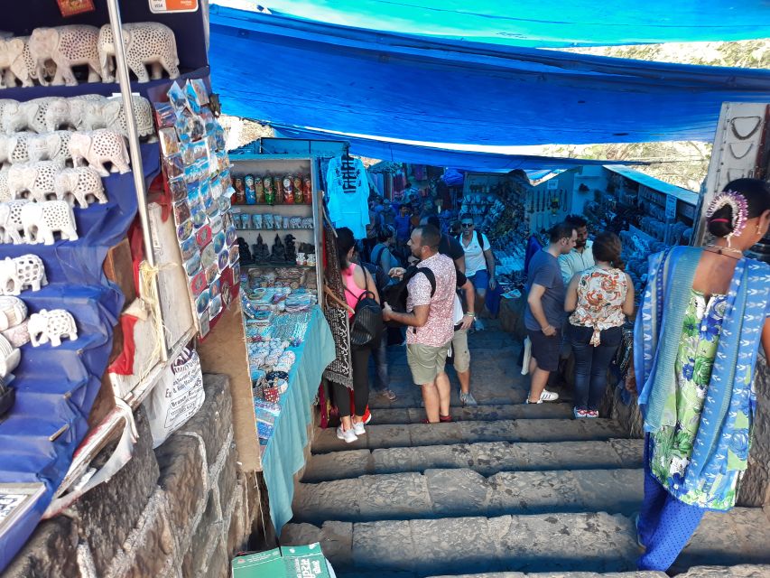 Mumbai: Guided Elephanta Island and Caves Tour - Inside the caves: the carvings, inscriptions, and photo moments that land