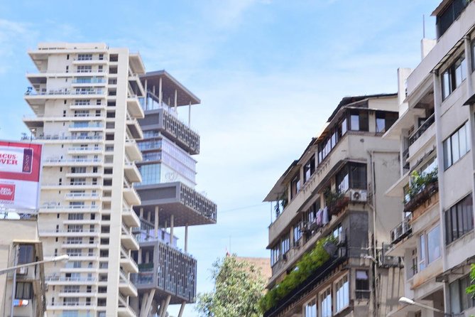 Mumbai Sightseeing with Dharavi Slum - Colonial-era Mumbai by car: universities, courts, clocks, and coastal viewpoints