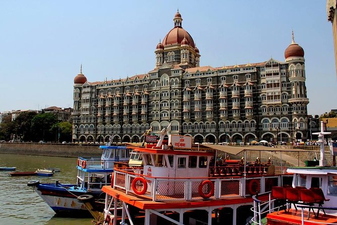 Mumbai Tour by Ac coach with pickup in Colaba & Mumbai Port only - Hanging Gardens for height views, then Mahalakshmi Temple for a spiritual stop